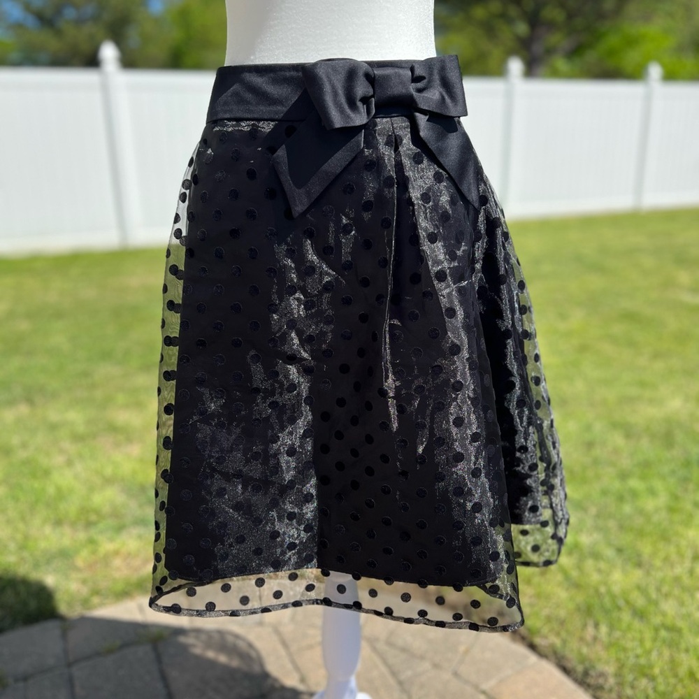 Elegant Black Polka Dot A-Line Skirt with Bow Accent on Waistband Size 12